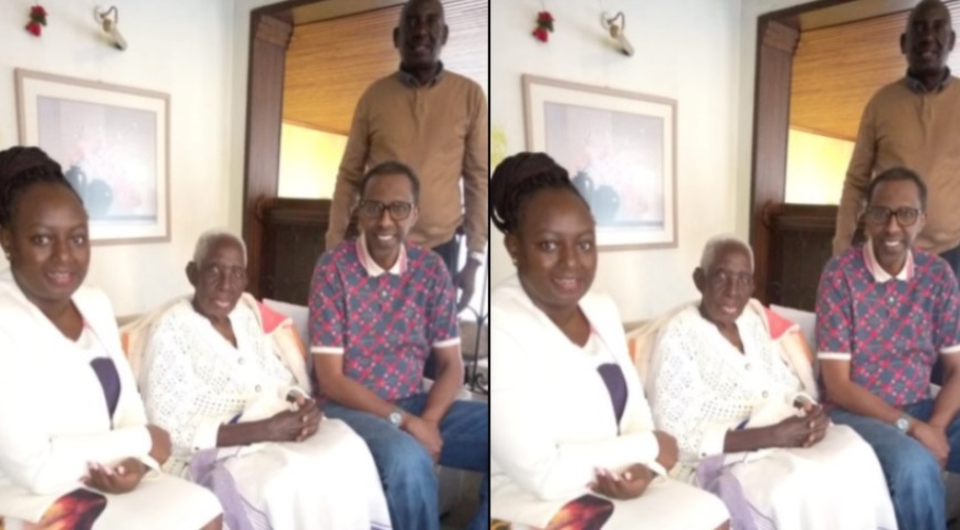 Ahmednassir alongside his eldest client, Mama Cherubet Chelugui, 93 years and family