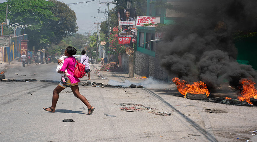 Haiti Suspected Gang Members Set On Fire As Conflict Spreads To Capital Suburb
