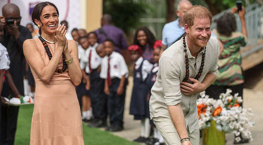 Prince Harry and Meghan Markle during their trip to Nigeria