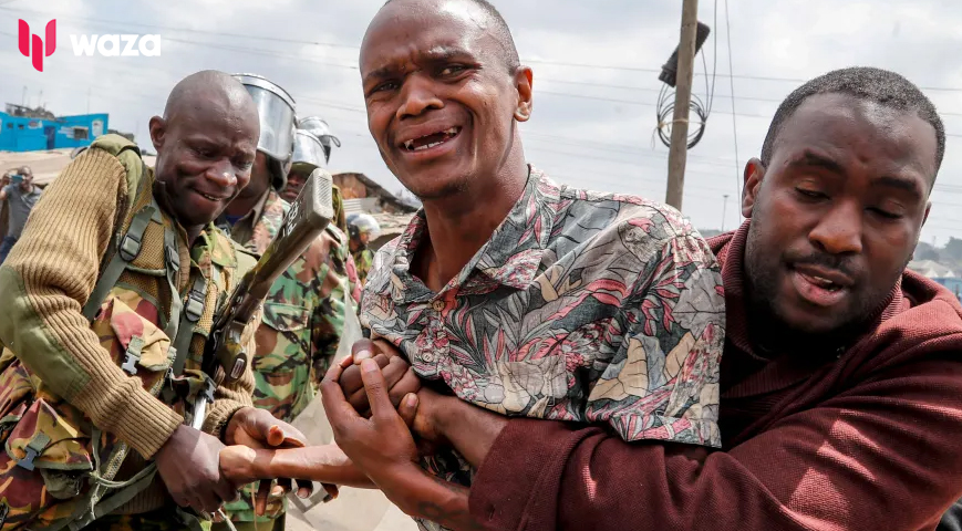 Police arrest a protester during clashes in the Mathare area of Nairobi