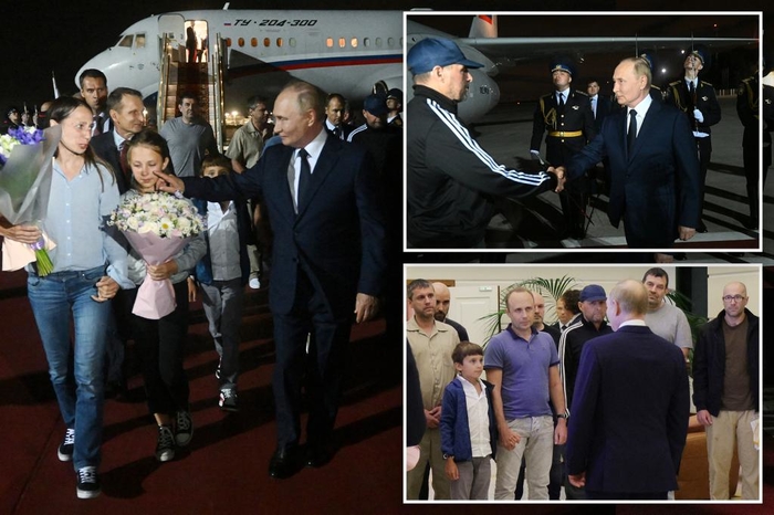 President Vladimir Putin and freed prisoners